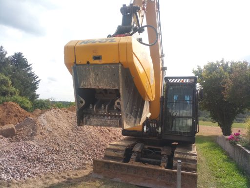 Bagger mit Brecherlöffel